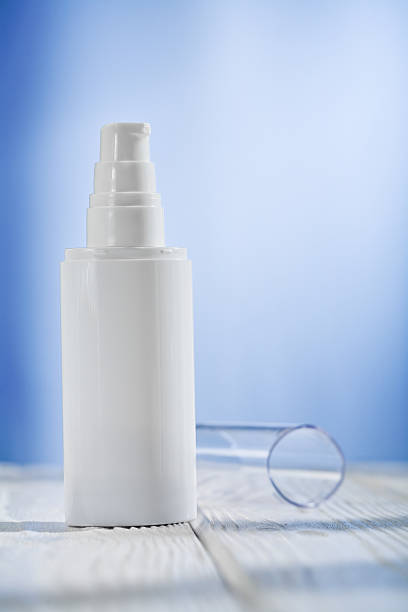 istock single skincare sprayer on white wooden table 468509204