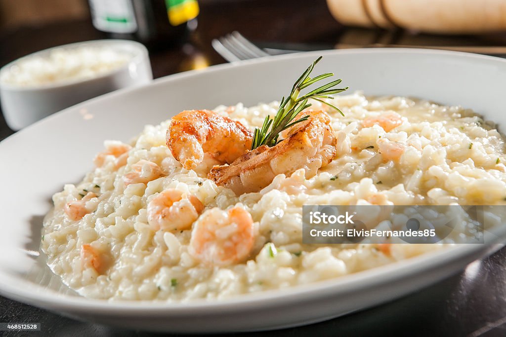 Shrimp risotto Shrimp risotto served at the table Risotto Stock Photo