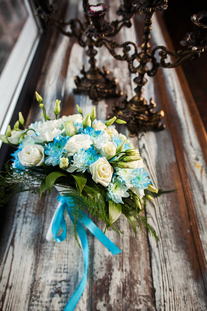 istock beautiful wedding bouquet on a wooden table with vintage candlesticks 468515152