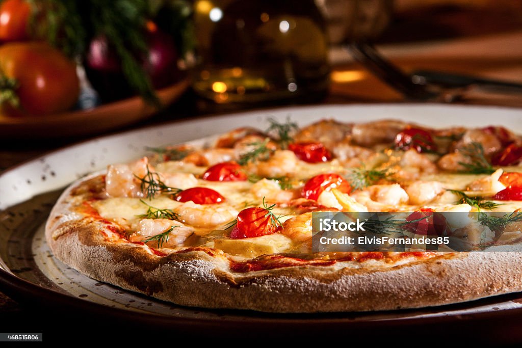 Pizza Pizza with food in the background Pizza Stock Photo