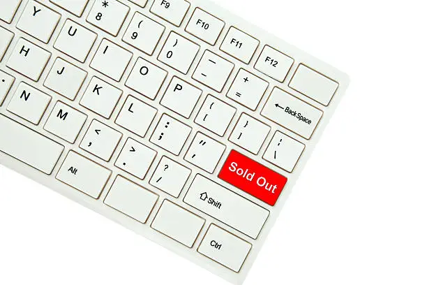 Photo of Wording Sold Out on computer keyboard isolated on white backgrou