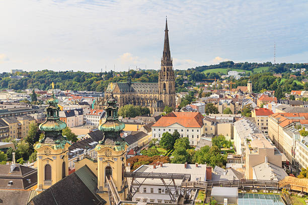 Rooftop view of Linz, Austria with New Cathedral Linz Cityscape with New Cathedral and Church of the Ursulines, Austria linz austria stock pictures, royalty-free photos & images