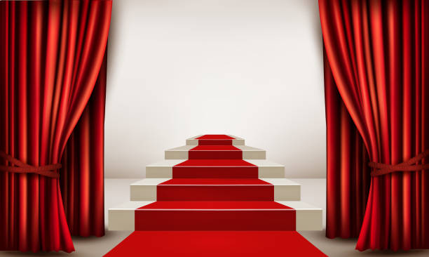 istock Showroom with red carpet leading to a podium with curtains. 468517720