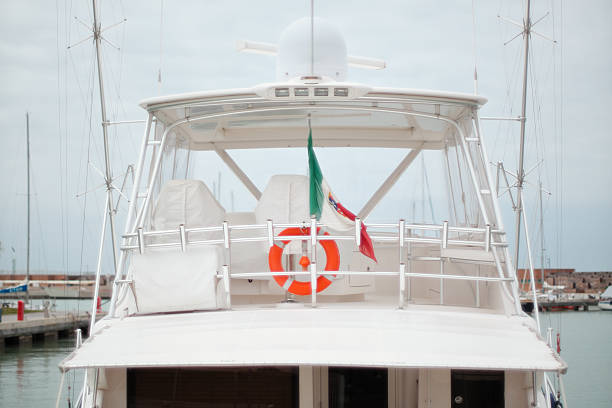 American national flag on boat in sea harbor