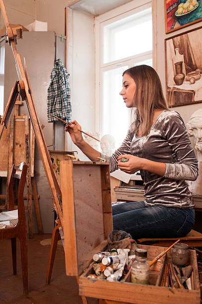 istock student in the studio for painting, drawing 468526262