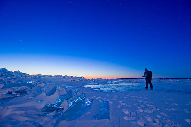 istock walking Ice and sun on Huron lake 468529818
