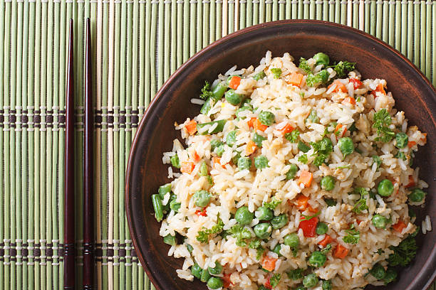 istock Japanese fried rice with egg, vegetables close-up top view 468532818