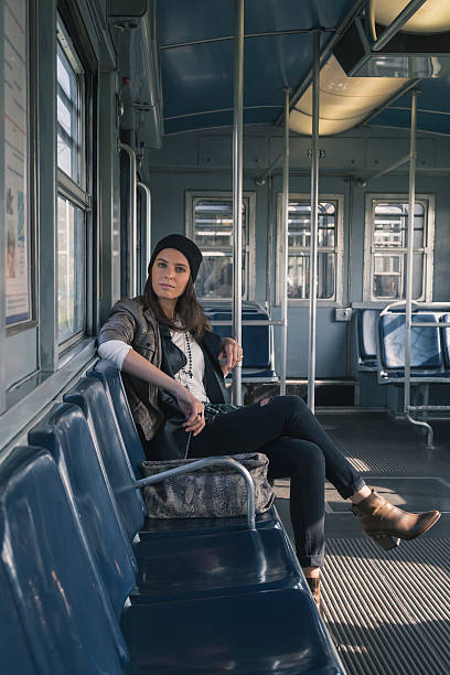 istock Pretty girl posing in a metro car 468533490