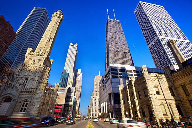 Magnificent Mile Magnificent Mile in Chicago, IL, US michigan avenue chicago stock pictures, royalty-free photos & images