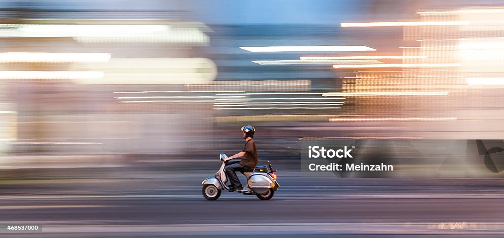 man with motorbike man with motorbike in speed in Vienna, Austria. Motorcycle Stock Photo
