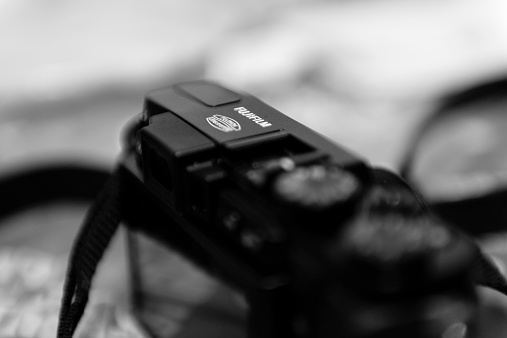 London, United Kingdom - January 1, 2015: Fuji X30 digital camera in black and white
