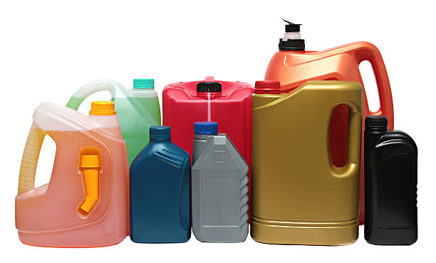 istock Plastic bottles from automobile oils isolated on white background 468543574