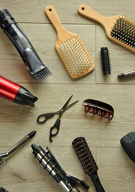 istock hairdressing tools on a wooden floor 468546332
