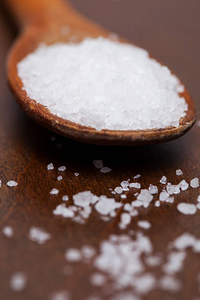 istock Ocean salt crystals on a wooden spoon 468547230