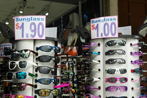 Singapore, Singapore - February 17, 2015: Colorful sunglasses for 1 Dollar in a shop in Chinatown in Singapore