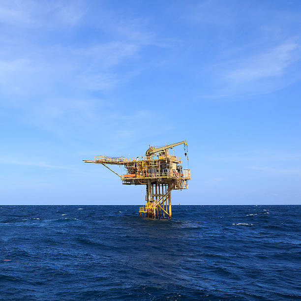 istock Three Legged Oil and Gas Production Platform 468551892