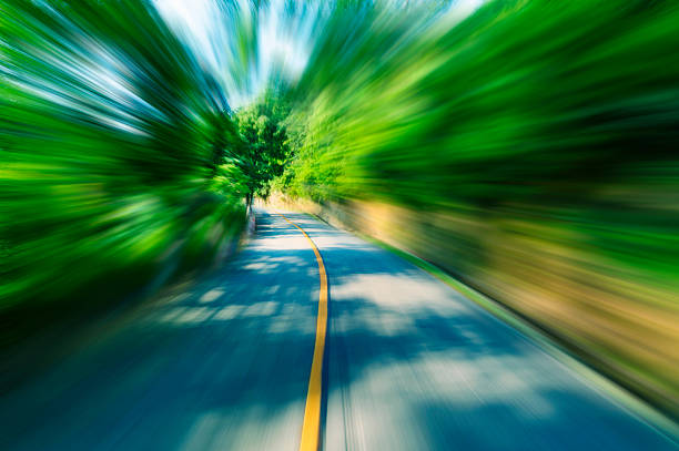 istock car on the road with motion blur background. 468557907