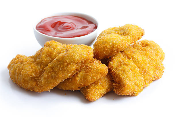 istock Golden fried chicken nuggets and tomato ketchup 468559734