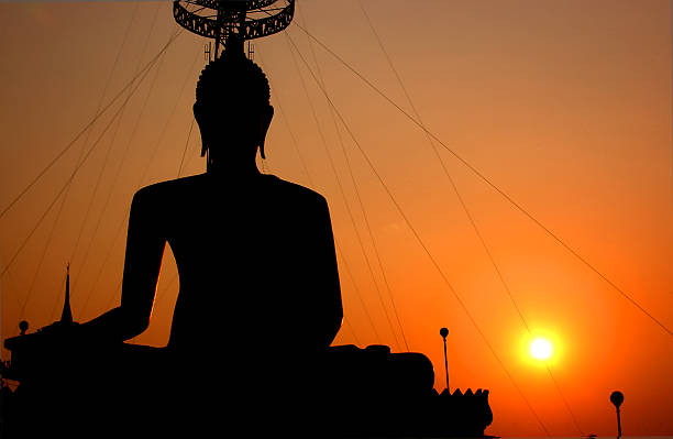 istock The Buddha's Silhouette cutting the sunset. 468565658