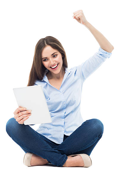 istock Excited woman looking at digital tablet 468566644
