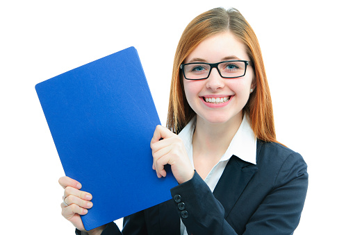 Happy young woman holding files for a job interview