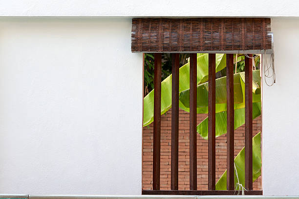 istock The  window on the white cement wall 468568644