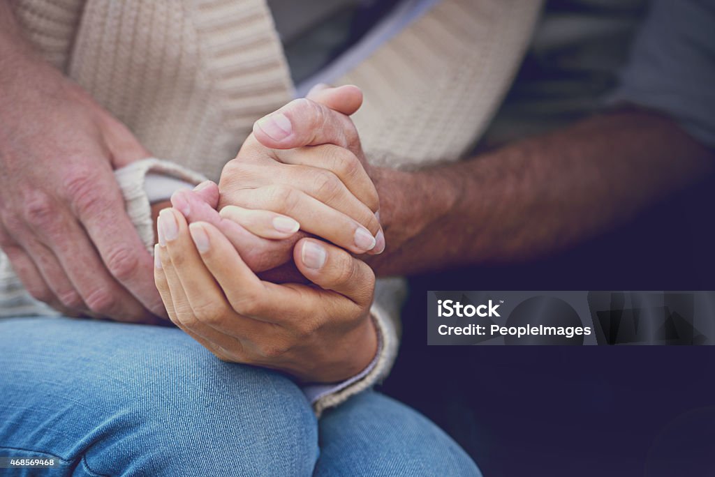 A loving hand Cropped image of a mature couple holding handshttp://195.154.178.81/DATA/i_collage/pi/shoots/781775.jpg 12 O'Clock Stock Photo