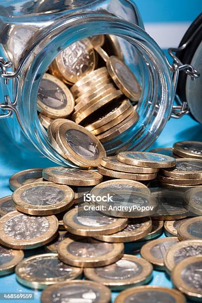 Euro Coins Spilling From Jar Stock Photo - Download Image Now - Coin, Collection, Container