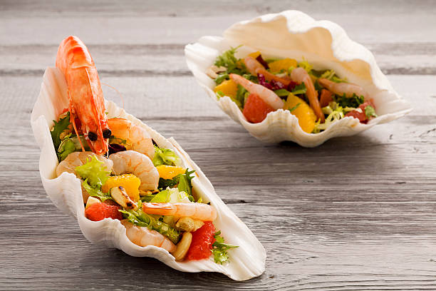istock Shrimp salad with grapefruit, orange and roasted peanuts. - Serv 468570412