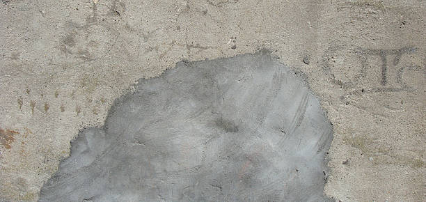 istock cloud like concrete repair on a dirty wall 468572986