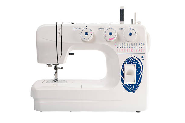 istock sewing machine of white color 468576814