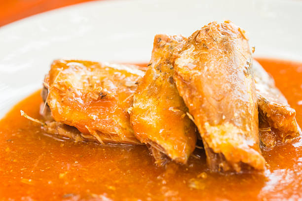 istock Canned fish in tomato sauce 468576972
