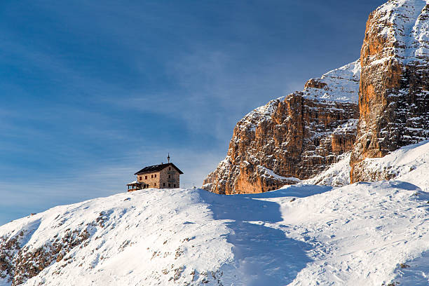 winter in the italian alps, with the ski slope full of snow