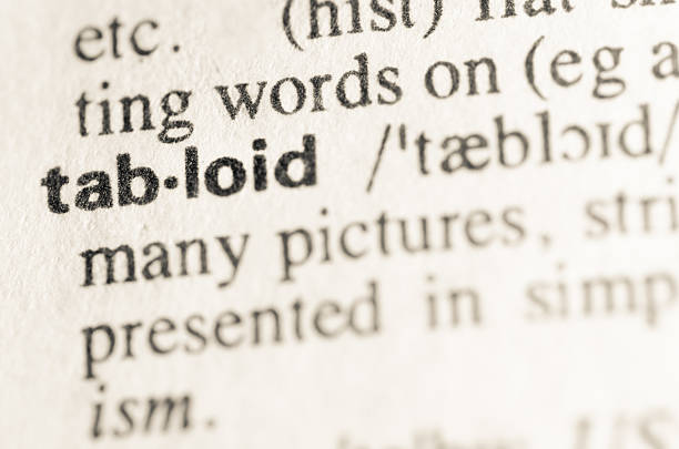 istock Dictionary definition of word tabloid 468579514