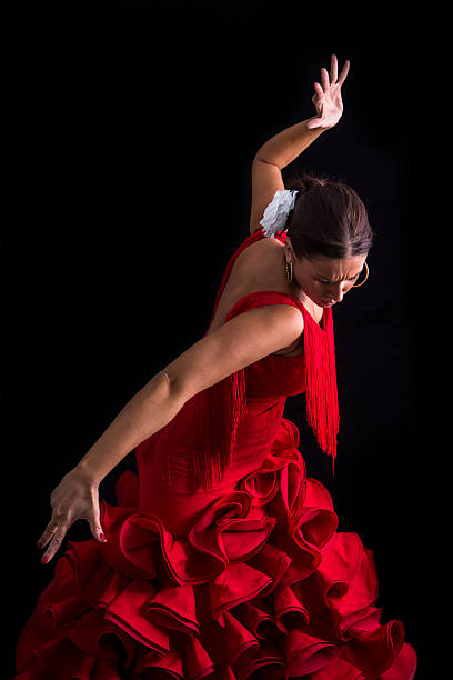 Flamenco dancer dressed in red with an expression stock photo