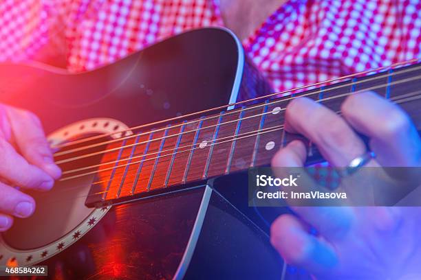 Male Musician With A Acoustic Guitar Stock Photo - Download Image Now - 2015, Adulation, Adult