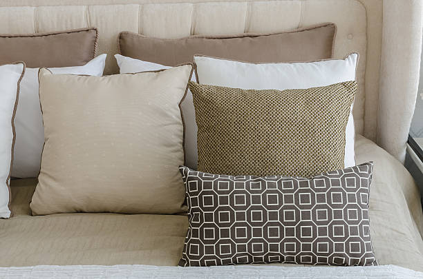 istock brown pillows on bed in bedroom 468584290