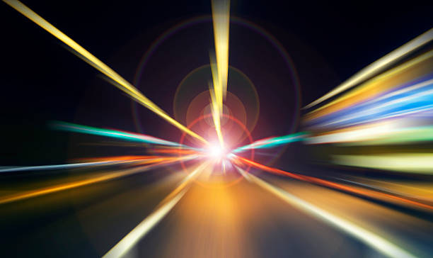 istock car lights on highway by night,abstract light speed trace 468584806