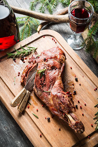 istock Roasted piece of venison and served with wine 468585103