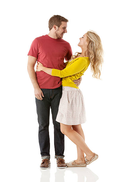 istock Cheerful couple standing with arm around 468585333