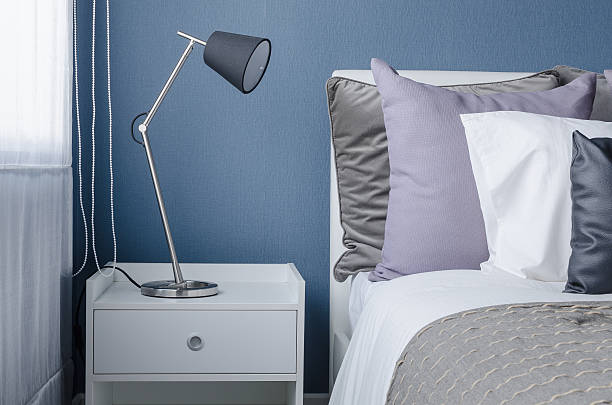 istock modern black lamp on white table in modern bedroom 468587944