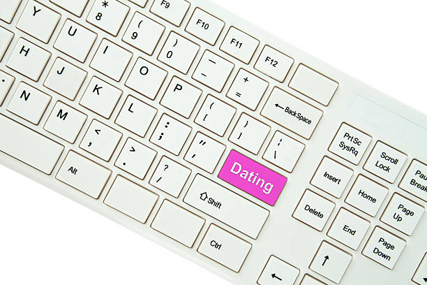 istock Wording Dating on computer keyboard isolated on white background 468590724