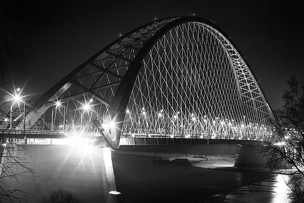 istock Traffic on night bridge. Abstract black and white photo 468591160