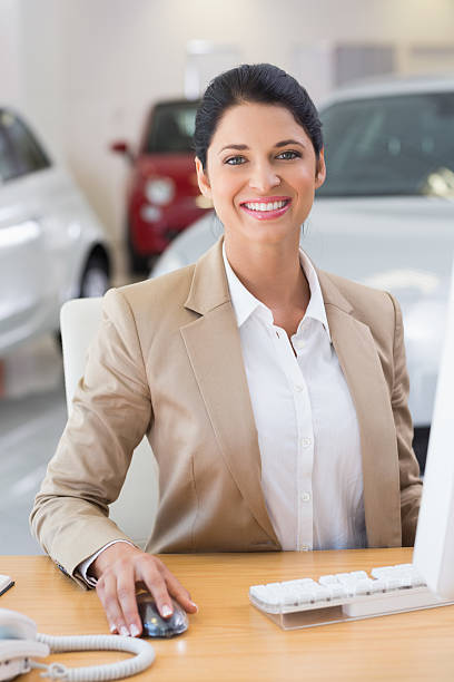 istock Smiling businesswoman working in her desk 468592988