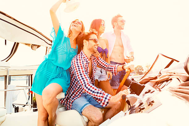 istock Young People Drive Yacht and having fun. 468594066