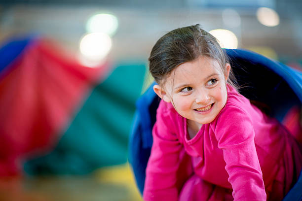 istock Little Girl in Obstacle Course 468594156