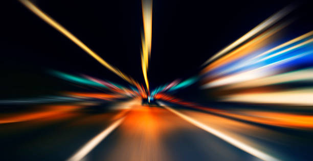 istock car lights on highway by night,abstract light speed trace 468594454
