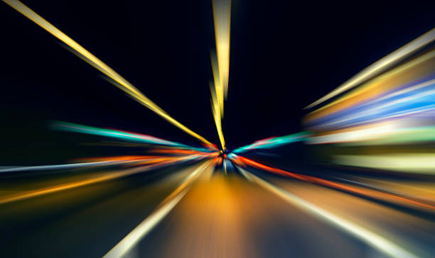 istock car lights on highway by night,abstract light speed trace 468594840