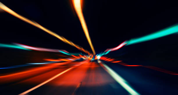 istock car lights on highway by night,abstract light speed trace 468594976
