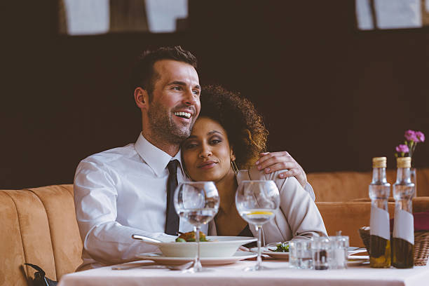 istock Happy couple at dinner in the restaurant 468595260